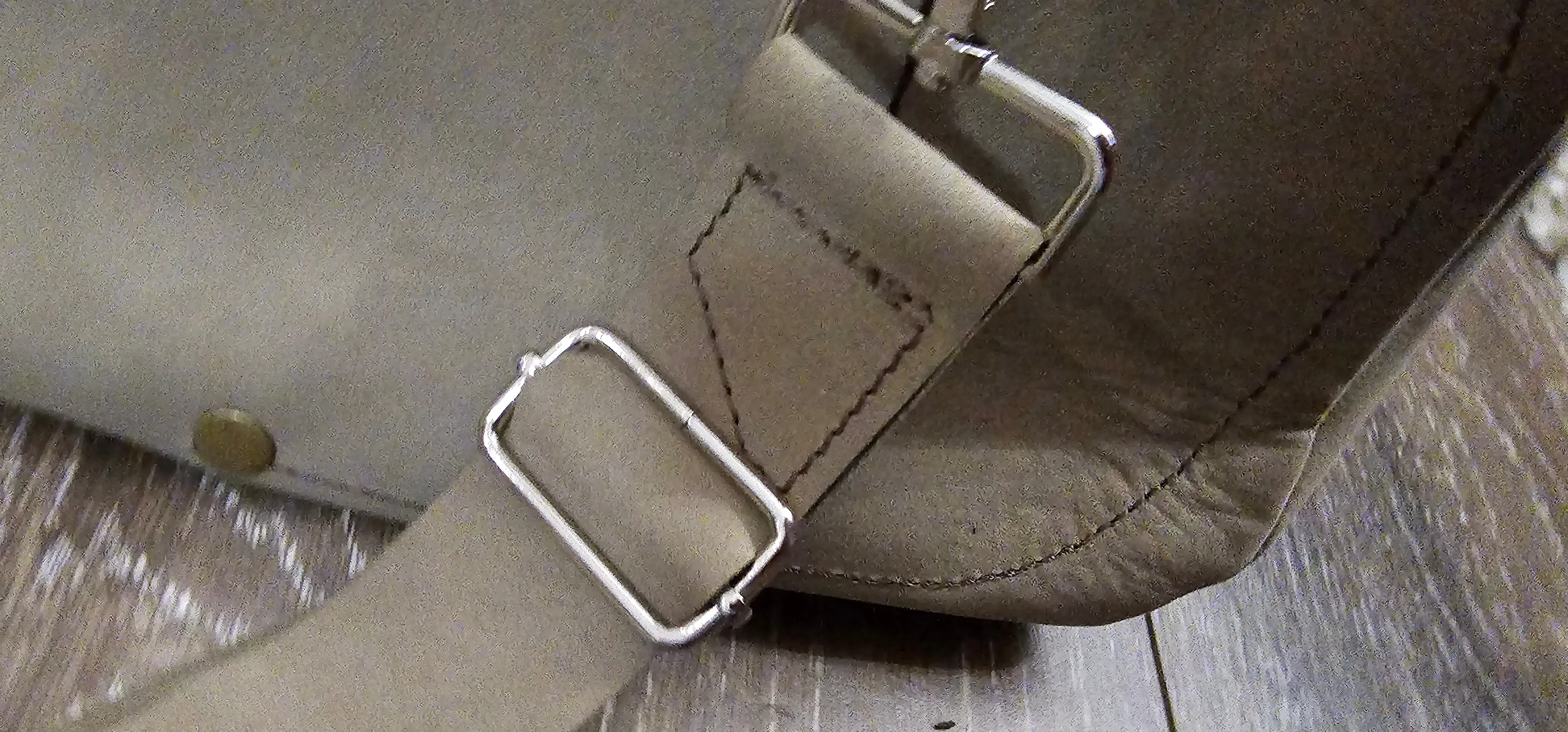 ** sale ** leather sling Moss colored.            slanted front zipper