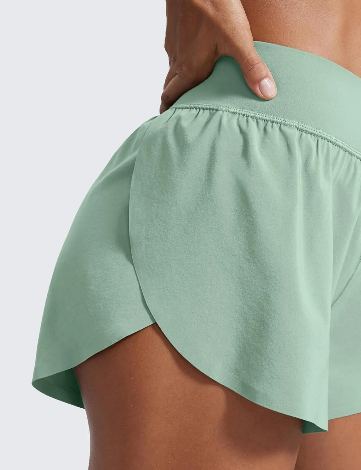 CRZ YOGA High Waisted Dolphin Athletic Running Shorts for Women 3" High Split Comfy Mesh Liner for Gym Workout Track
