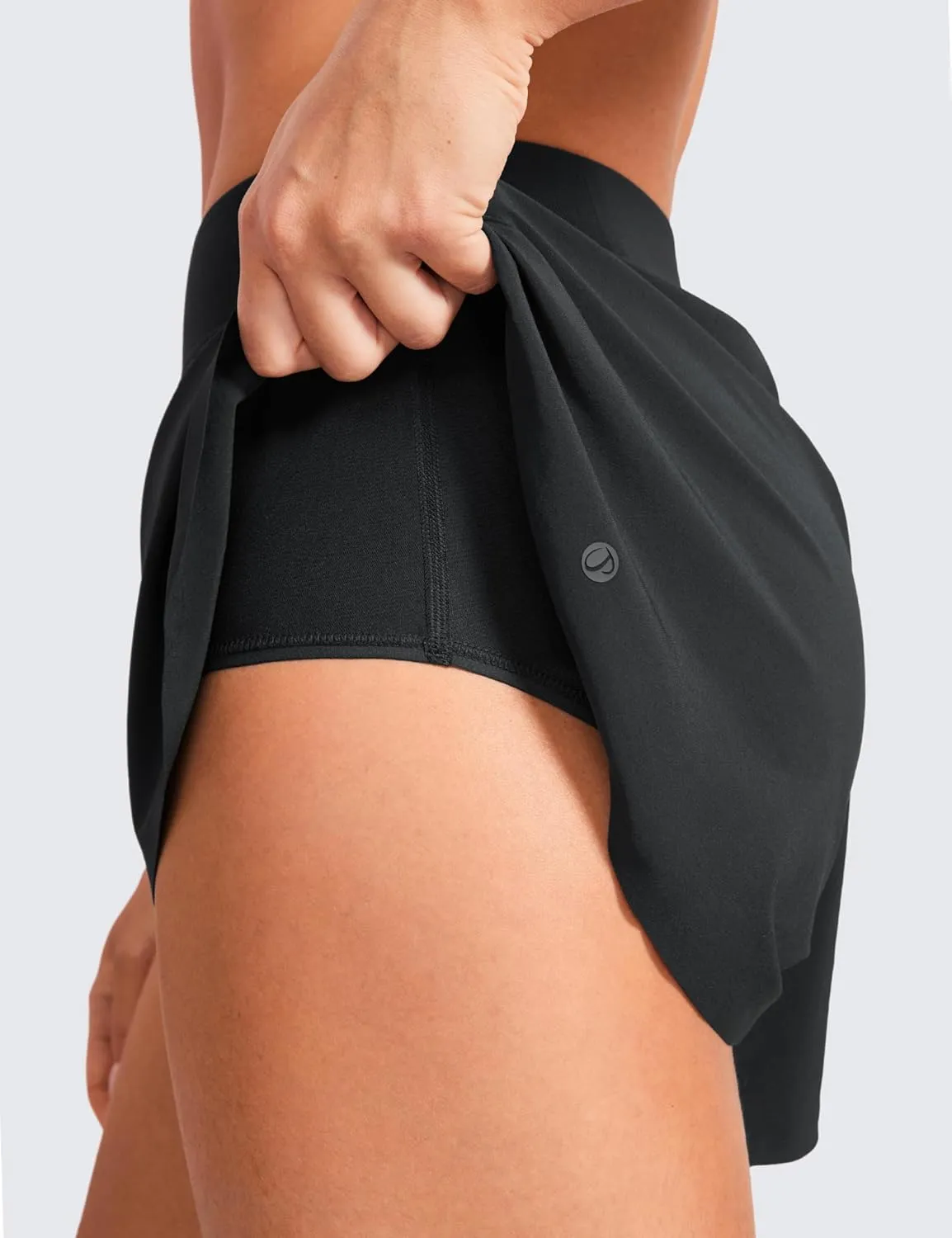 CRZ YOGA Mid Waisted Dolphin Athletic Shorts for Women 4" Lightweight High Split for Gym Workout with Liner Quick Dry