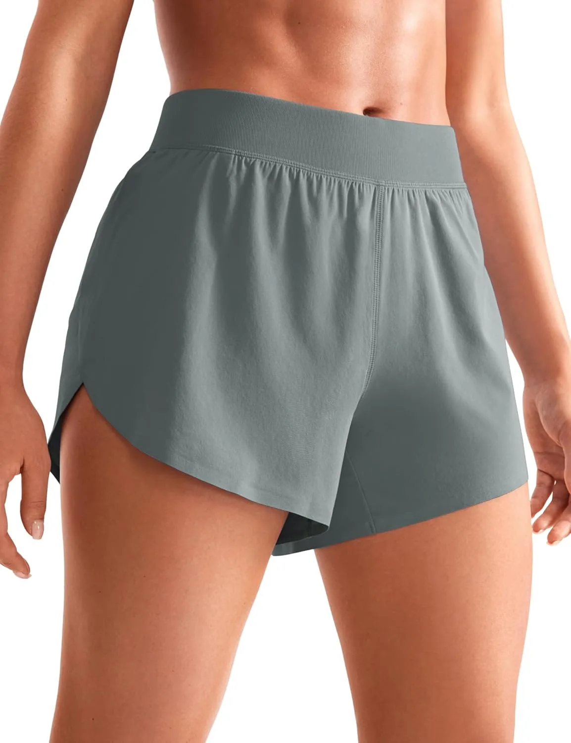 CRZ YOGA Mid Waisted Dolphin Athletic Shorts for Women 4" Lightweight High Split for Gym Workout with Liner Quick Dry