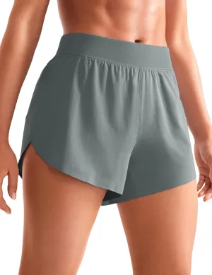 CRZ YOGA Mid Waisted Dolphin Athletic Shorts for Women 4" Lightweight High Split for Gym Workout with Liner Quick Dry