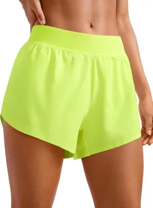 CRZ YOGA Mid Waisted Dolphin Athletic Shorts for Women 4" Lightweight High Split for Gym Workout with Liner Quick Dry
