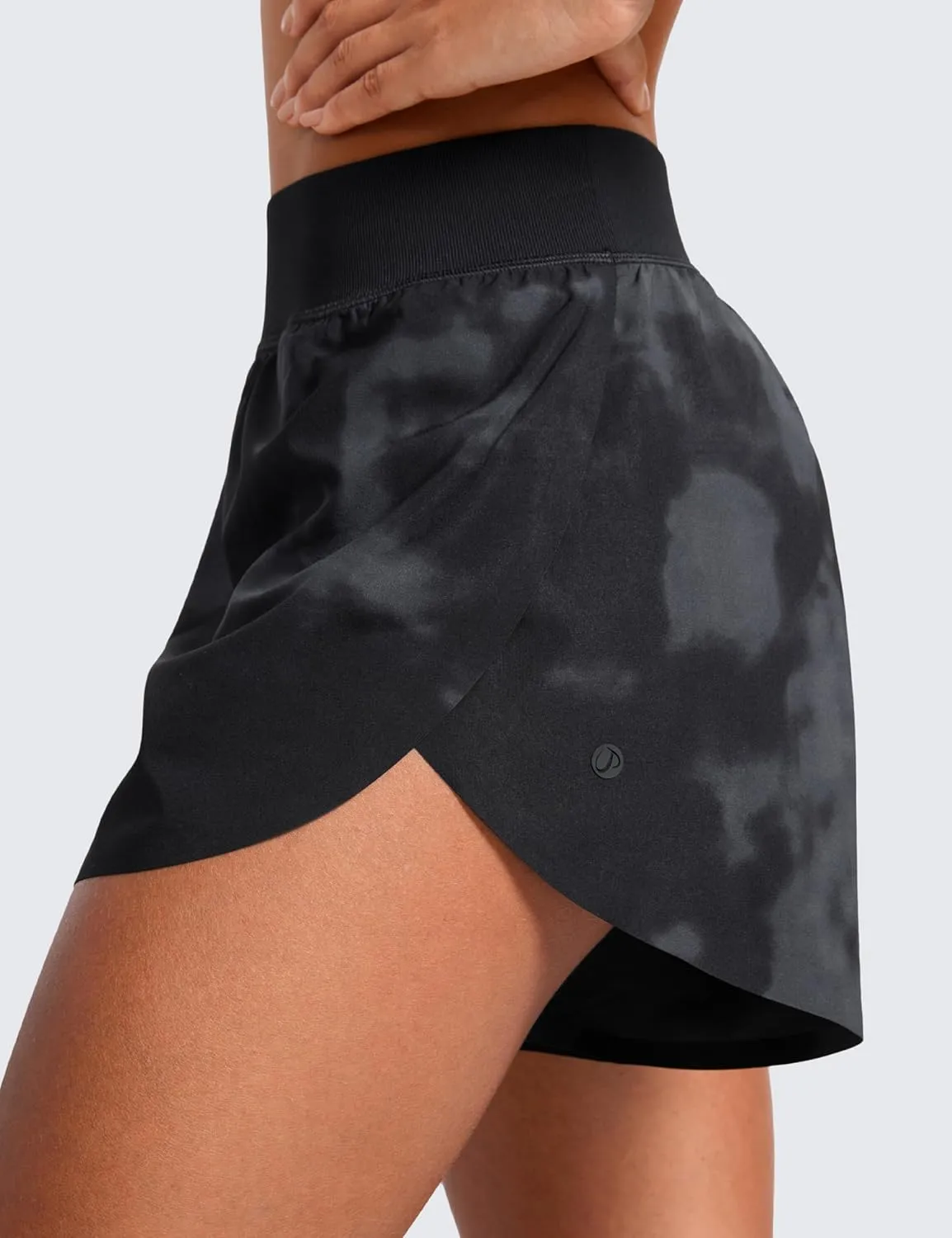 CRZ YOGA Mid Waisted Dolphin Athletic Shorts for Women 4" Lightweight High Split for Gym Workout with Liner Quick Dry