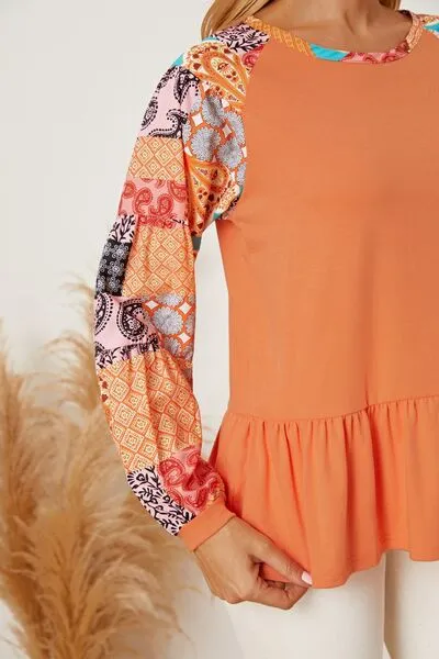 Printed Round Neck Peplum Blouse