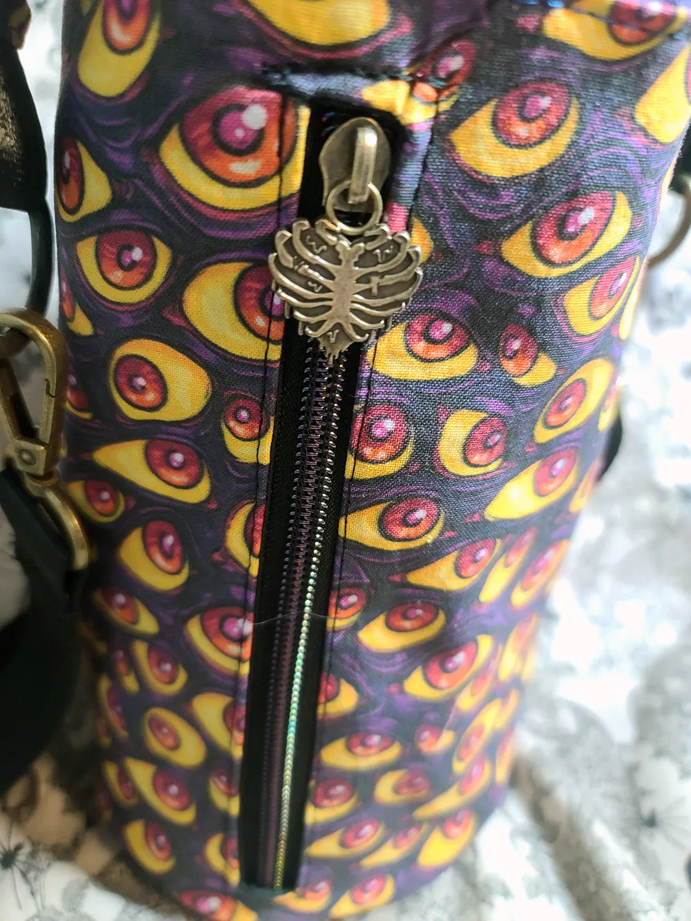 Slim Wall of Eyes Waterbottle Sling CLEARANCE