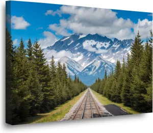 Snow Capped Mountain Range Straight Railway Track Tall Evergreen Trees Flanking Sides Vivid Blue Sky Fluffy Clouds Rugged Peaks Misty Shrouds Perspective View Nature Wall Decor Canvas Print Poster
